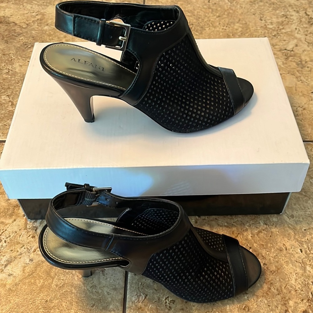 Black Alfani sling back pump.